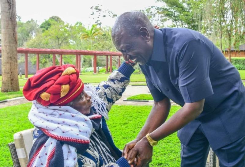 File Image of President William Ruto with the late Field-Marshal Muthoni wa Kirima at Sagana State Lodge, Nyeri County.